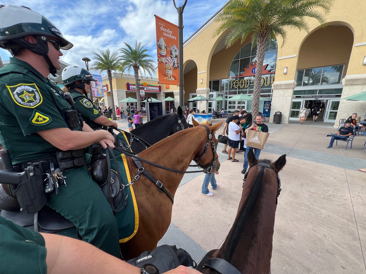 OrangeCoSheriff's tweet photo. As part of Operation Safe Holiday, OCSO’s Mounted Unit patrolled @OrlandoPOVine today. Our deputies and their four-legged partners are here to make sure everyone is safe as they continue to shop this holiday season.
#OperationSafeHoliday #HappyHolidays https://t.co/HeTl25BhW7