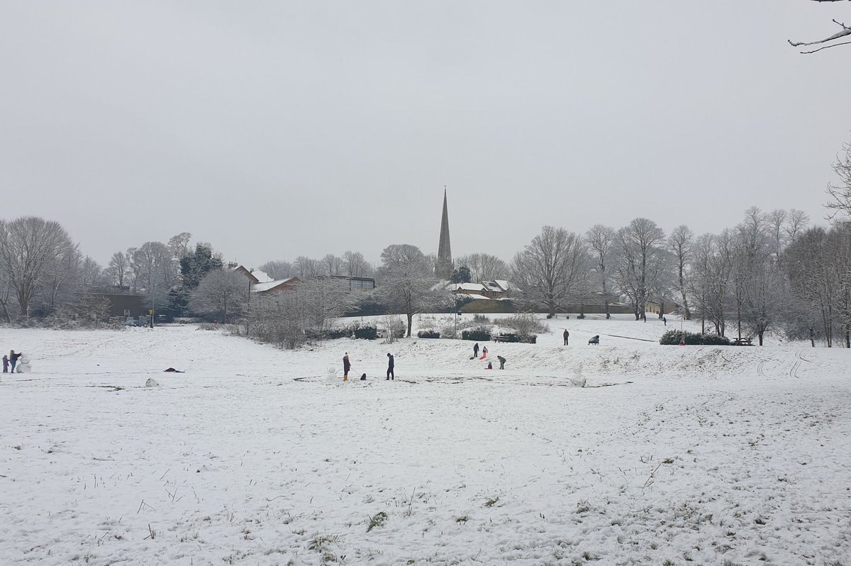 A timeless winter scene. Snowmen and sledging #ChesterleStreet