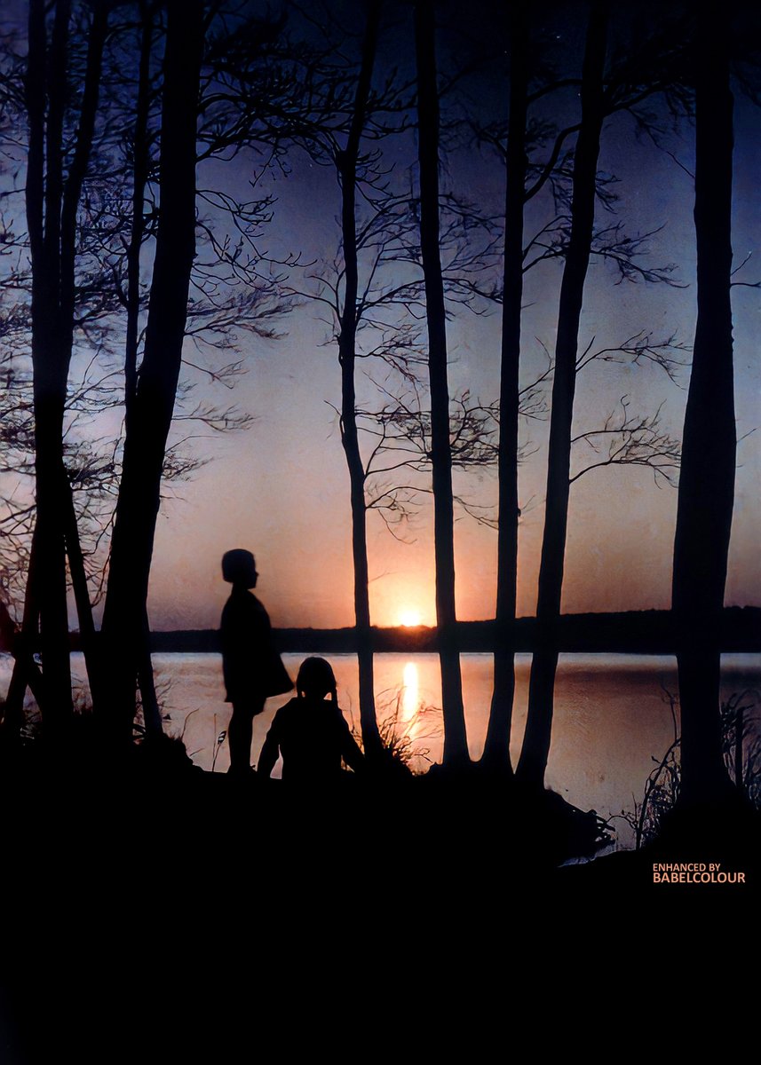 This wonderful, striking autochrome by Friedrich Paneth of his children by a lake at sunset was taken a hundred years ago and is original colour (it's not colourised). I find it a very evocative image, rather like the old silhouette Christmas cards I received as a child.