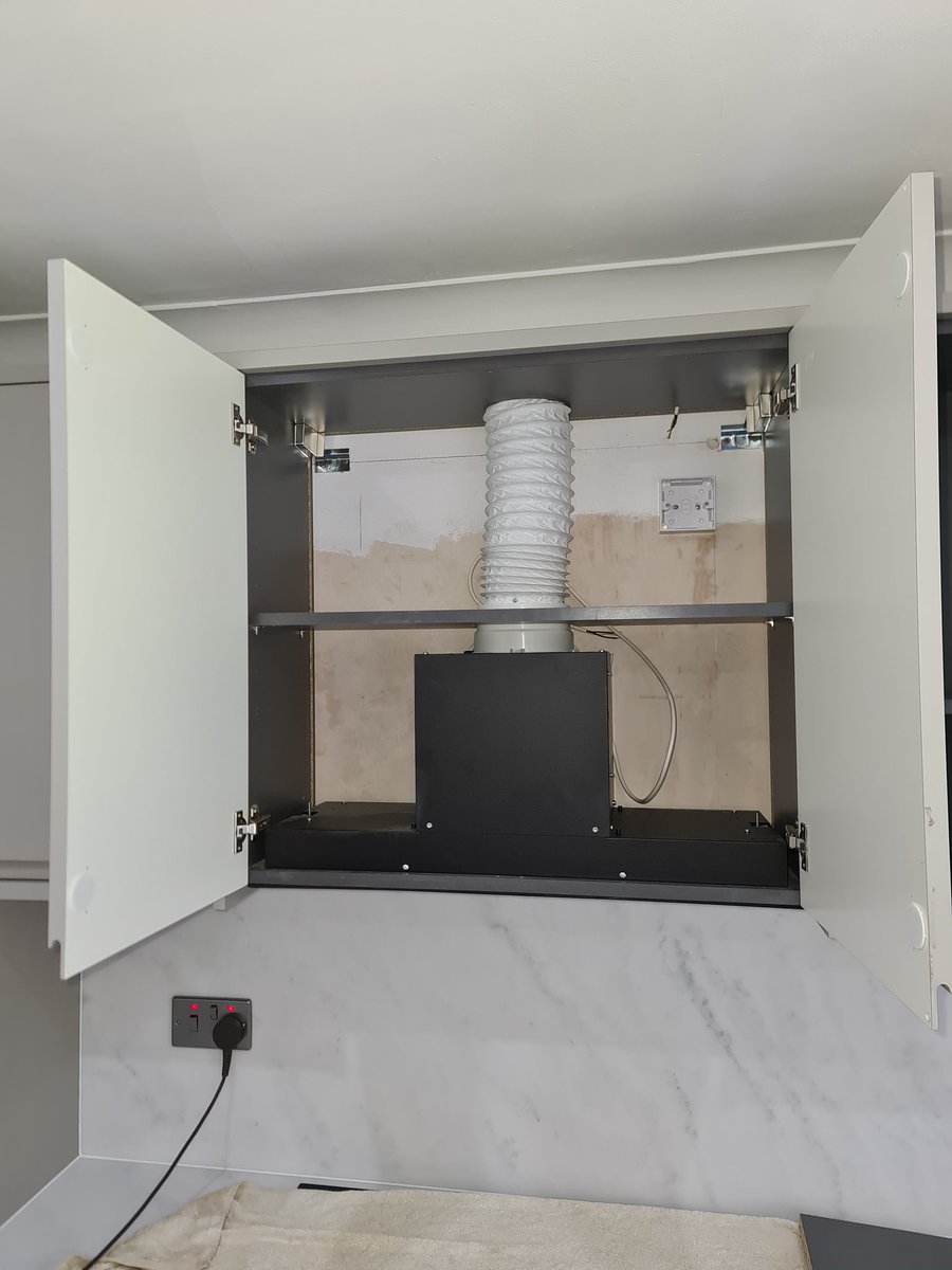wedding_shoot's tweet photo. @Wickes I was told I would get a built in extractor that worked and looked like the showroom picture-instead I get this. Missing parts and vented into my house. Damaged doors and fridge hanging out. 23 days later and still no resolve. https://t.co/KJmTwGlt96