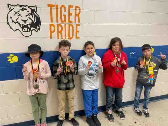 ELMESTigers's tweet photo. Fourth grade is so proud of their amazing students who scored proficient on their Math and Reading Benchmarks!!! 🧡🖤🐾 #RoarToSuccess https://t.co/flw1Bqf12P