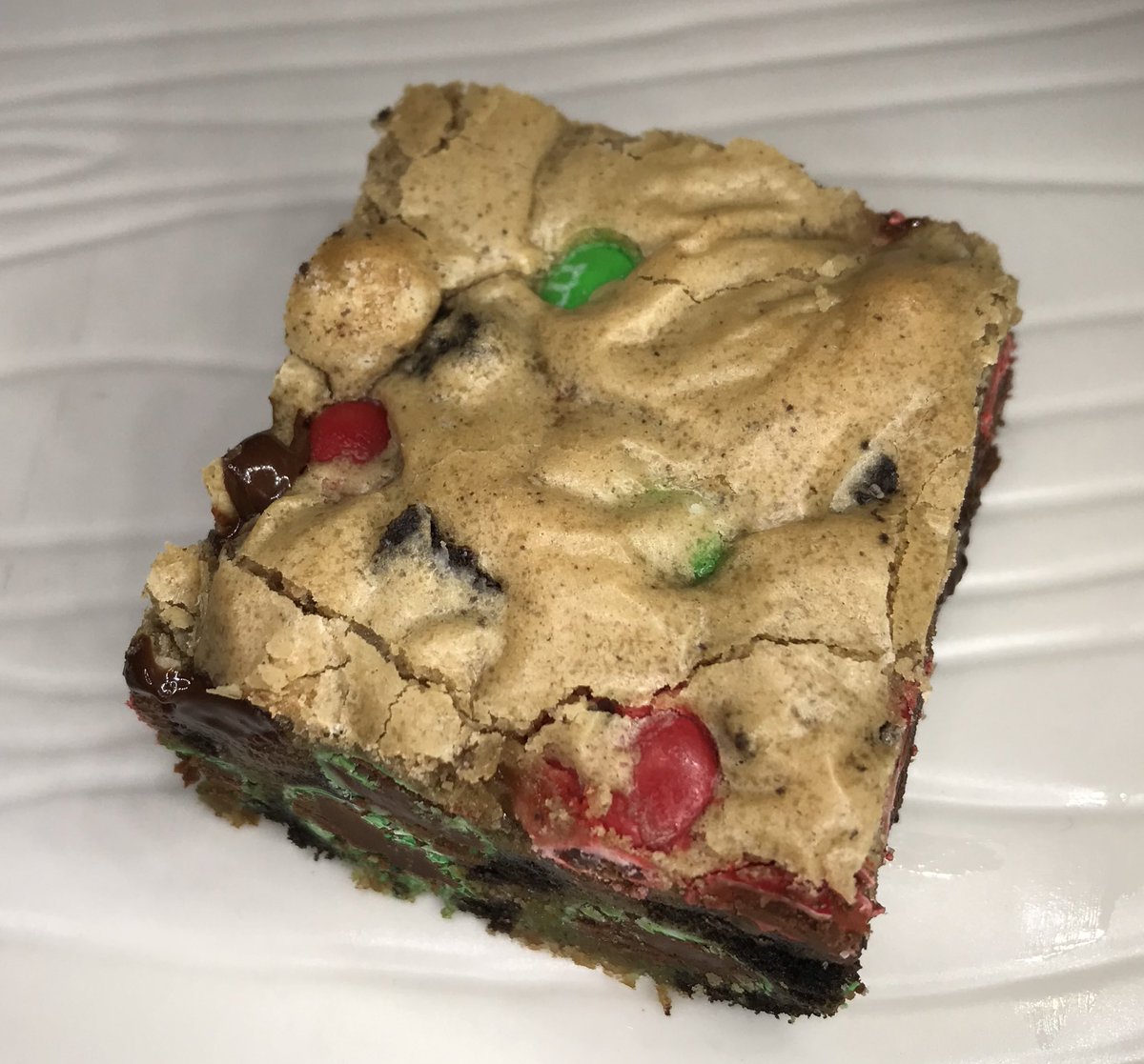 December’s Cookie of the Month is our Holiday Blondie. Loaded with red and green M&Ms, Oreos and chocolate chips, it will keep you coming back for more. Order some today and find out for yourself!