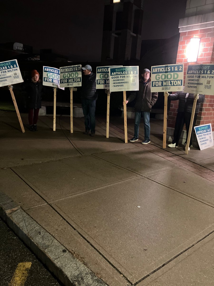 AbundantHomesMA's tweet photo. AHMA is live at Milton High for Milton’s Special Town Meeting! We are hoping for a yes vote on Articles 1 and 2 in compliance with the MBTA Communities Act. 20+ pro-housing advocates are standing outside with signs before the meeting. Stay tuned for updates🧵 https://t.co/uBWa7bhiKJ