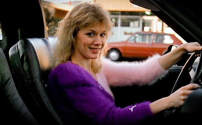ThatEricAlper's tweet photo. In Fast Times at Ridgemont High, the blonde woman in the Corvette is played by Nancy Wilson, member of the rock band Heart. She was dating screenwriter Cameron Crowe, and later married him. https://t.co/MORrnWRiXS