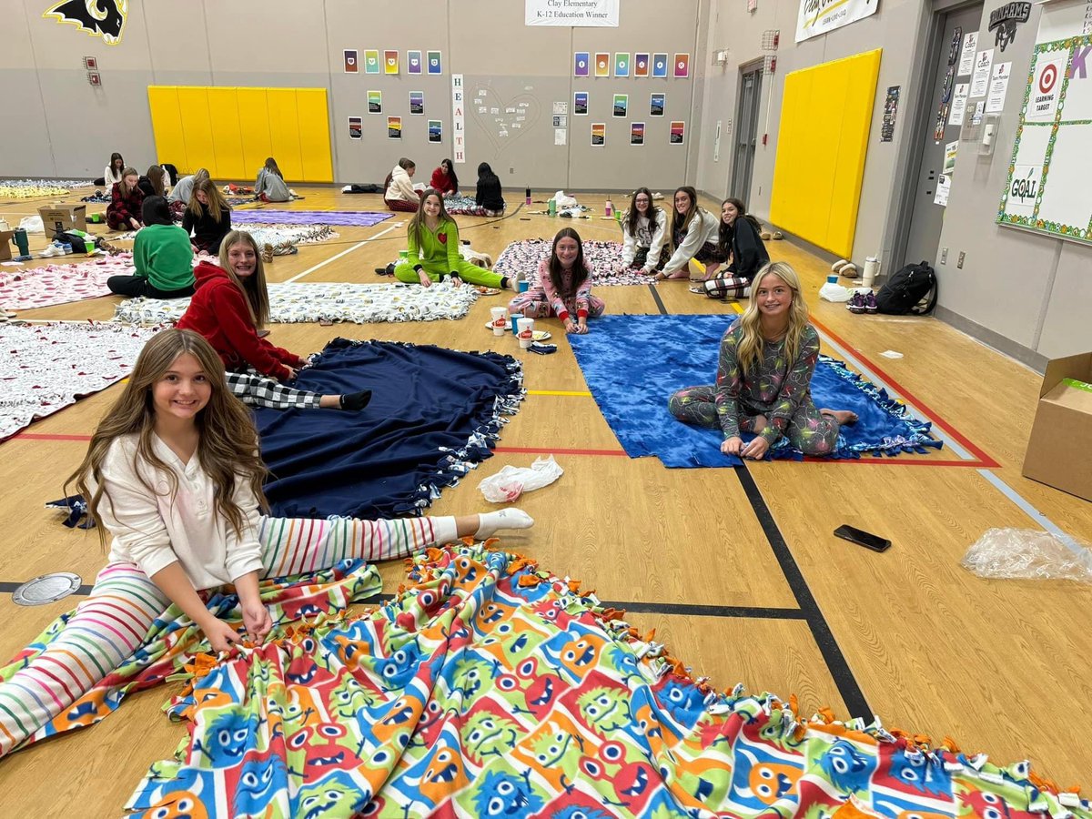 mare_peterson's tweet photo. My favorite @rhyth_a post-state tradition. 
Blanket making for Childten and Families of Iowa, Christmas music, Christmas jammies,and snacks. 
#ilovethiscrazyteam #1sep https://t.co/unx5pV4K48