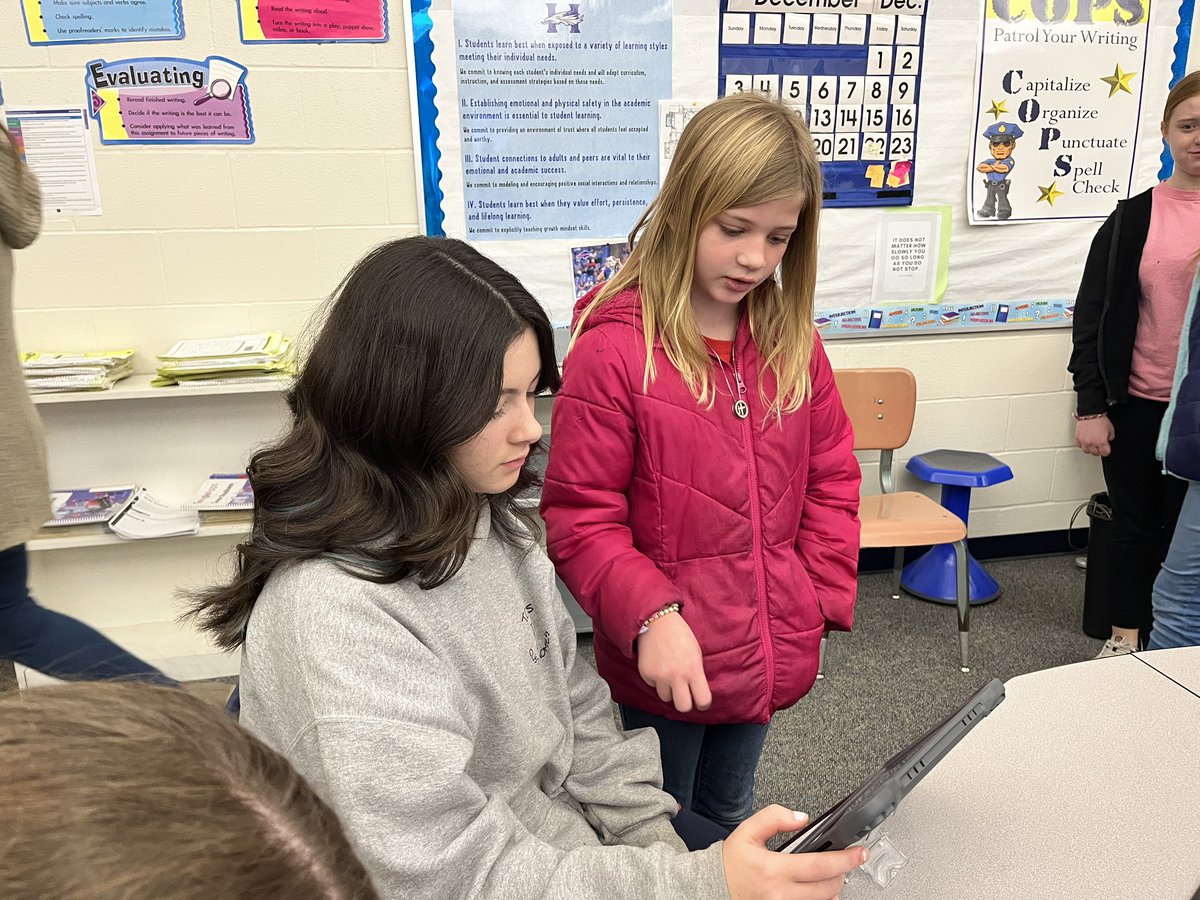 hiebert_amy's tweet photo. I ❤️ #applecoaching with @santoya_14! Jr High Ss in @MrsHill_HMS class created app prototypes in #keynote to teach 1st graders grammar. Best of all, 5th graders helped teach them how to create the prototypes! Creating with purpose &amp; cross grade collaboration… that’s good stuff! https://t.co/8vhO6N4xUY