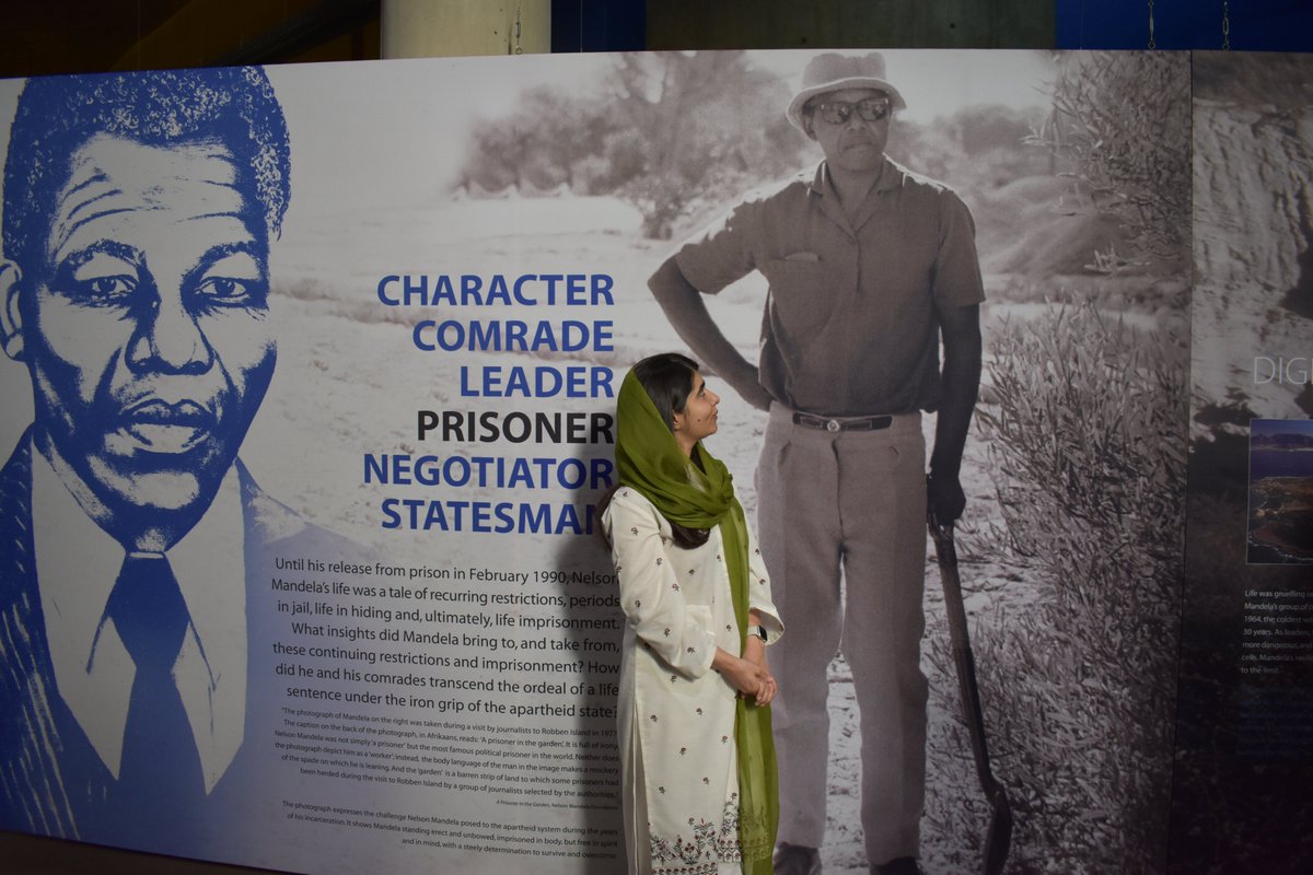 Malala's tweet photo. Heita from South Africa 🇿🇦👋 My trip began with a moving tour of the Apartheid Museum, a truly humbling and eye-opening experience and one that helps prepare me for the reason I came to Johannesburg: to deliver the @NelsonMandela Annual Lecture. https://t.co/soi7M9CN8p