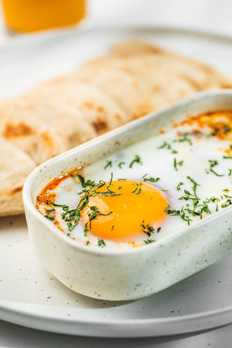 BiancoCoffeeMv's tweet photo. Kulhimas Shakshuka;
a Mediterranean-inspired shakshuka with a local twist, featuring spiced tuna in a tomato paste and spice blend, topped with a baked egg. Served with flatbread, your choice of tea, or fresh fruit juice.

#darkbrewslightbites 
#biancocoffeemv https://t.co/E2iARxb8UD