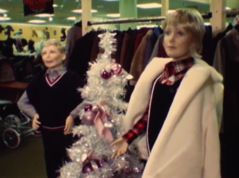 motelcrossroads's tweet photo. A Rackhams Department Store Christmas display in 1980. Could be a young Sandy and Jill, although while 'Jill' certainly wears her coat like Meg in full festive flounce, 'Sandy' is posed more like Larry Grayson.  #Rackhams #Christmas #ShutThatDoor #Crossroads #Nolly https://t.co/W4272dnbcM