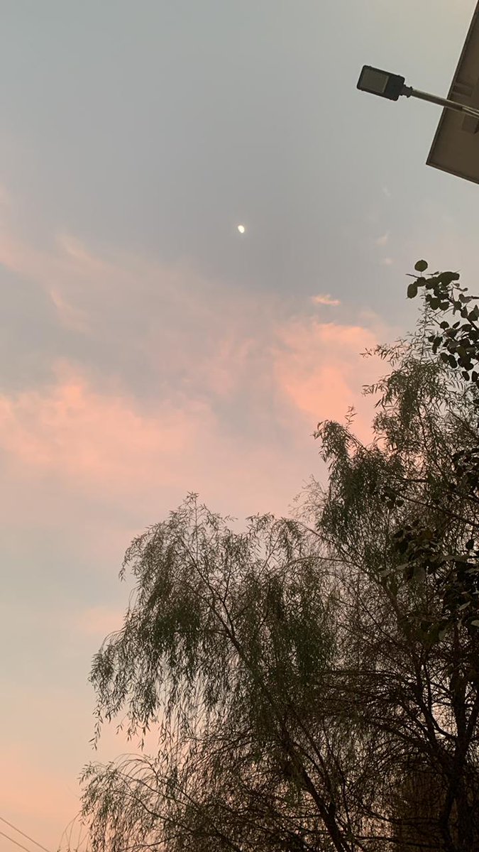 theJuly7th's tweet photo. The magic of dusk with nature's artwork and the moon shining bright above. https://t.co/54Rk91x4jW