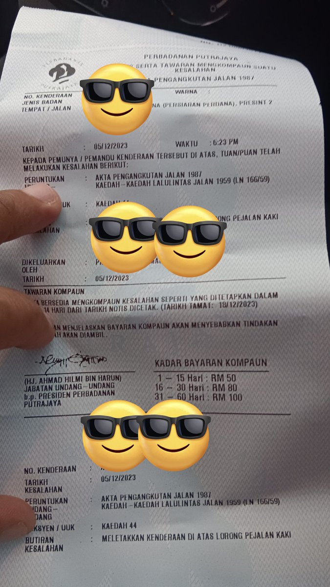Kikiki... Dah la eMadani tak lulus .. sekali kena saman parking plak kat Putrajaya ...