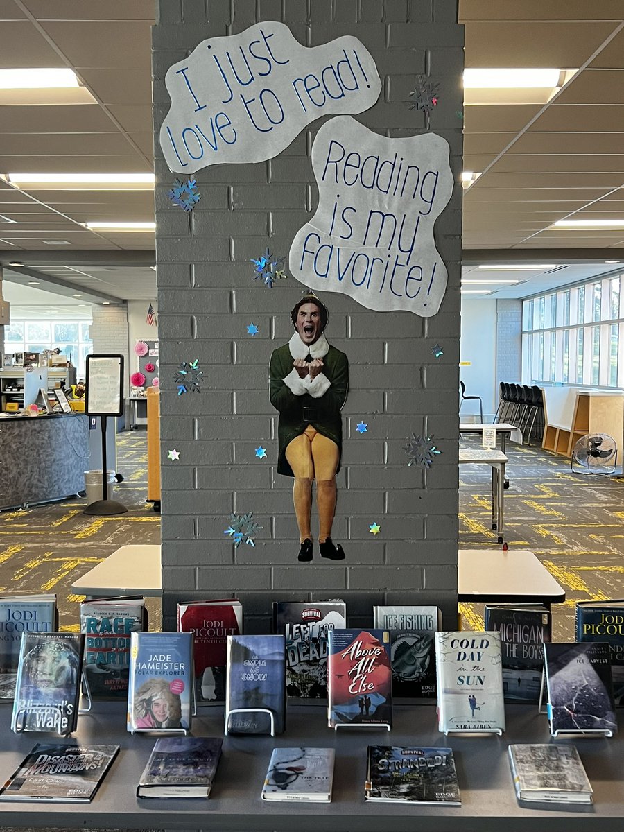 Come say hi to Buddy the Elf and check out a book to keep you warm! #highschoollibrary #library #librarydisplay