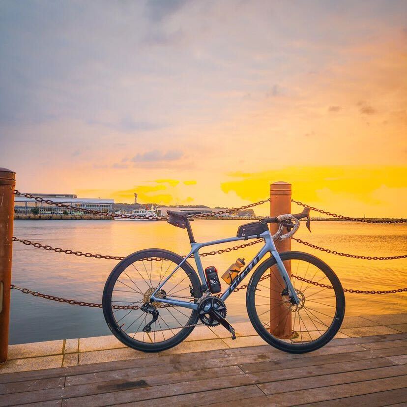 TKG's TCR takes in a beautiful sunset by the coast! ☀️ #TCRTuesday #RideUnleashed