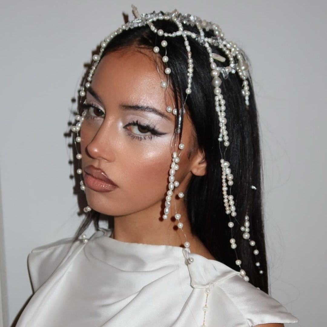 saintdoII's tweet photo. her white swan serve she was easily best dressed last night https://t.co/TYbJbo6e77
