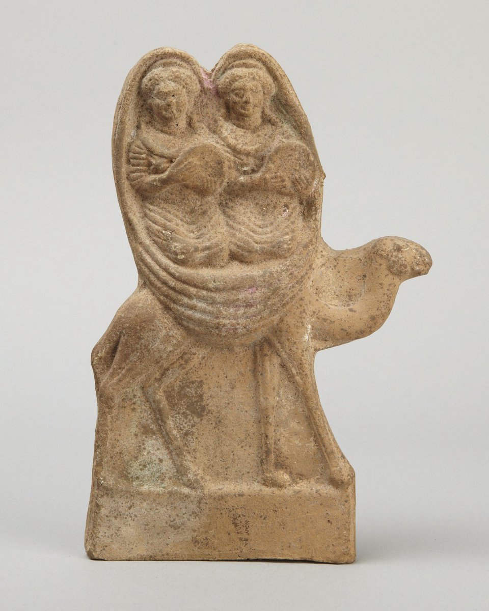 1st c. CE Roman terracotta from Syria, depicting two female musicians on a camel. They each hold a tympanum, a hand drum. If you look closely, you can see traces of bright pink pigment that once decorated their shared cloak. #polychromy Princeton University Art Mus. (y1952-53)