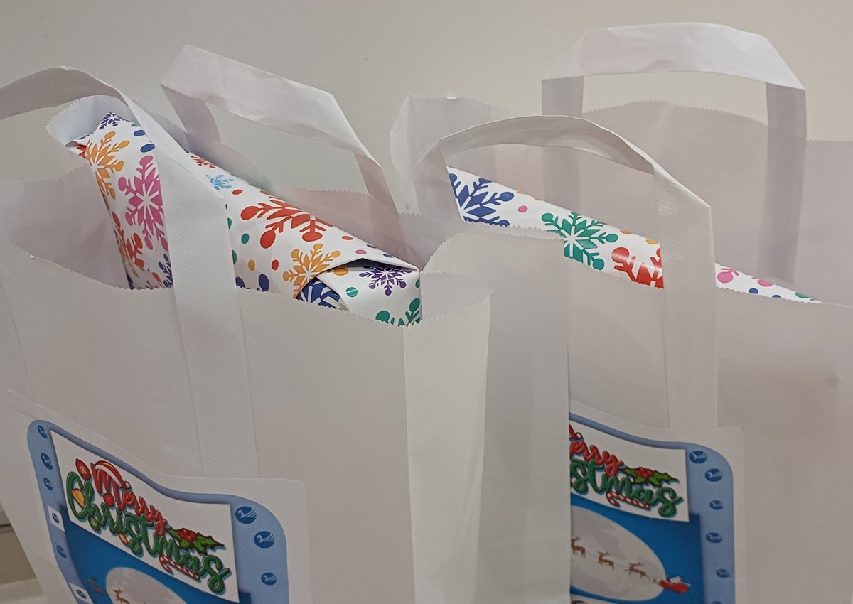SHolmesArt's tweet photo. Saving them for the big day! Thanks you @NorthLivAcademy and @emily_vernon for the Christmas presents for the children of staff at NLA https://t.co/pAD9ddktyq