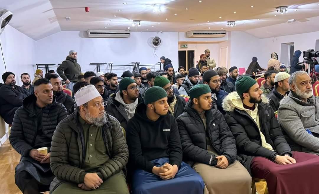 HammadQadriMQI's tweet photo. Shaykh Hammad Mustafa al-Madani al-Qadri recently held a discourse for the MMG youth of Sheffield. 

The lecture delved into the profound topic of ‘The Flight of the Heart to Higher Kingdoms,’ portraying the heart as a spiritual vessel longing for the divine presence of Allah and the realms of heaven. It further encompassed the metaphorical journey of the heart’s elevation, drawing inspiration from revered figures like Sayyida Maryam from the Holy Qur’an, whose unwavering devotion since youth exemplified divine acceptance.

Emphasising the necessity of a guiding figure, or shaykh, the discourse highlighted the imperative role of spiritual mentors in navigating this intricate path. The heart’s purification process emerged as a crucial element, requiring the shedding of desires and thoughts hindering proximity to Allah while illuminating through remembrance and profound love for the Divine.

The teachings of the Holy Prophet ﷺ illuminated the heart’s pivotal significance in moral and spiritual fortitude, categorising four types of sins that corrupt it. The transcendence beyond these sins becomes the gateway for the heart’s ascent to celestial domains. 

The lecture delineated the spectrum of hearts: those ensnared by worldly desires, others bound by the allure of paradise, and the rare dimensionless heart, transcending earthly attachments, solely seeking Allah.

The narrative further unraveled through the transformative journeys of revered spiritual personalities like Sayyid Nizamuddin Awliya’ al-Dihlawi and his disciple Amir Khusrau, alongside the inspiring metamorphosis of Imam Bishr b. al-Harith. These accounts epitomised the spiritual odyssey towards true ascent, marked by taqwa, achieved when the heart draws intimately close to Allah.