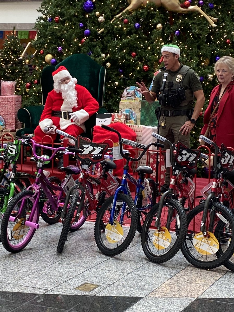 What a wonderful way to get in the holiday spirit!! Safe Santa, Boulevard Mall. So many kids left with bikes, helmets and toys!!