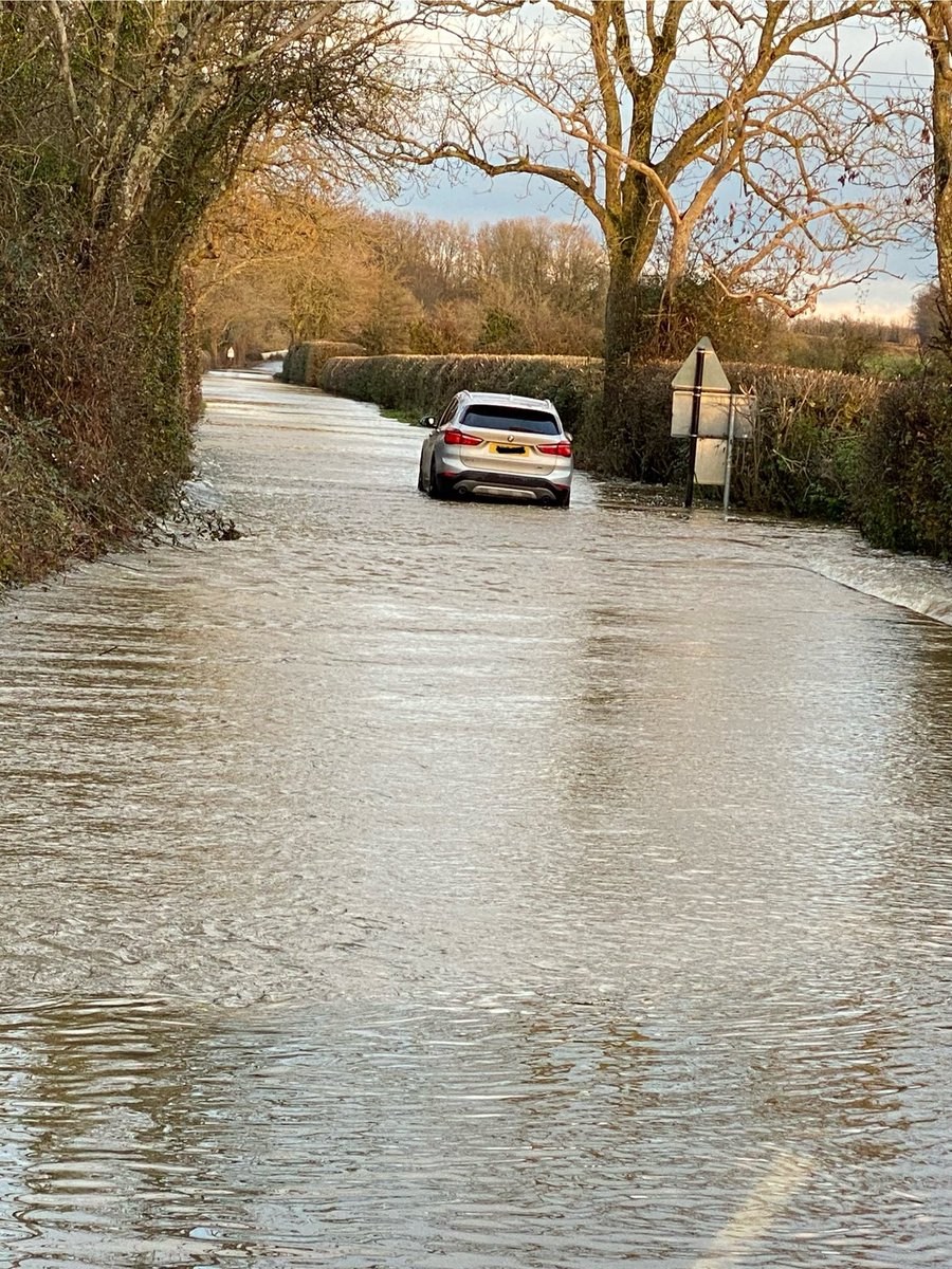 Mill Lane through Sturminster Marshall towards White Mill Bridge totally impassable (with an abandoned car) #flood & other roads in the village have rising water levels - take care! @Wave105Travel @TravelDorset