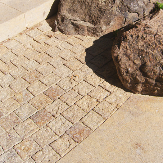 An attractive use of Amande Limestone as a paving solution in a combination of Pineapple and Course Adze hand finishes.
#rhodesarchitecturalstone #naturalstone #naturalstonedesign #handcraftedstone #carvedstone #stonemasonry #buildingstone  #stonedesign #landscapedesign