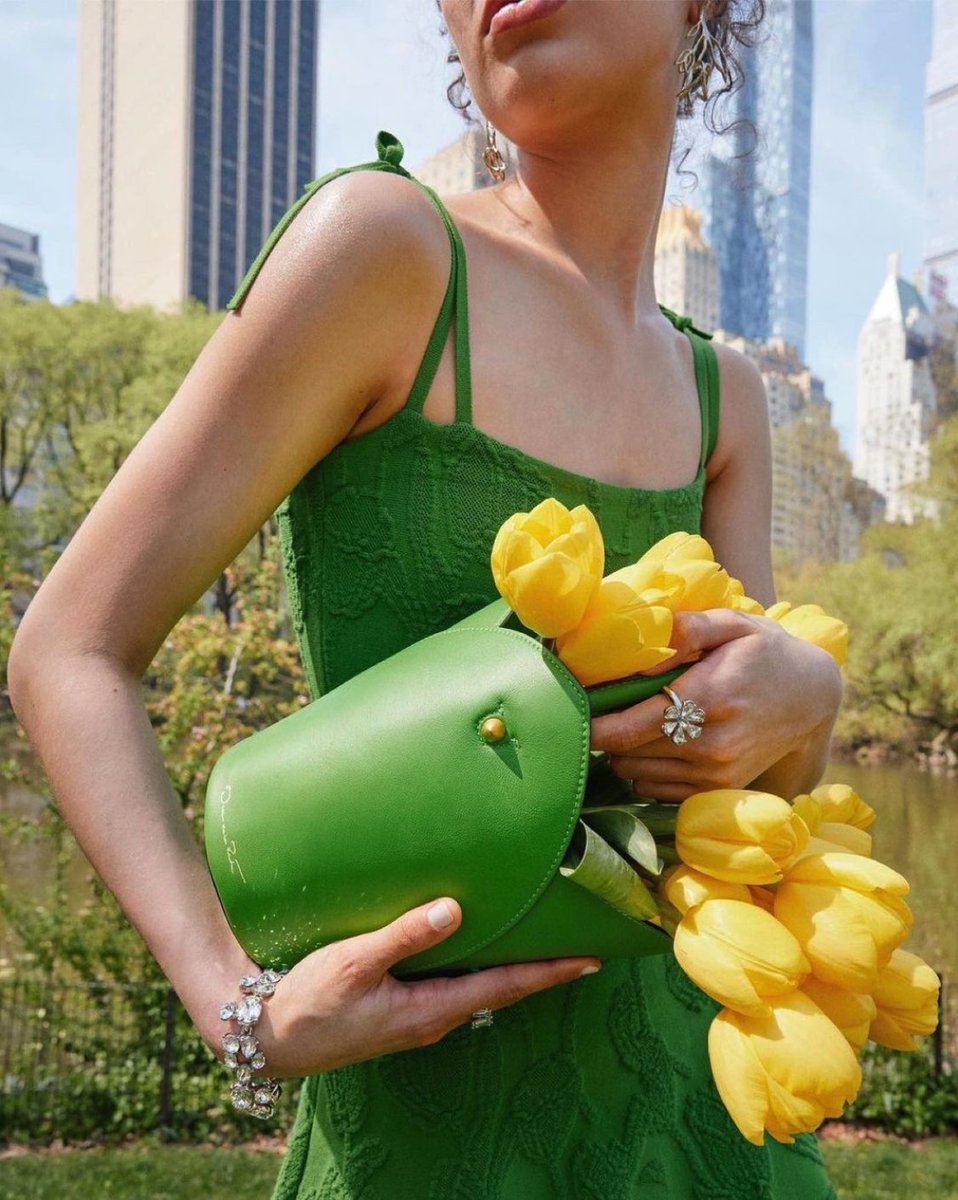 Tulipmania. The <a href="/oscardelarenta/">Oscar de la Renta</a> #odlrspring2023 Tulipan in meadow is dually flower vase and daytime handbag. #odlrforeverspring #LatinGlam
