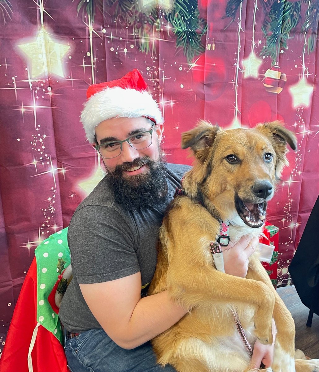Got Penny's picture taken for her first  Christmas. She was...not happy about it.