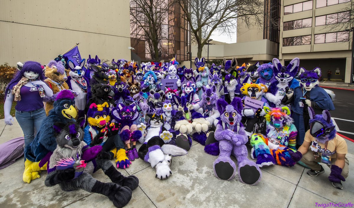WOO HOO! Here it is! The #PurplePic from #MFF2023/ @FurFest! Thank you to all you amazing PurpleFurs for showing up & handling all the chaos so well! Big thanks to @KingerRiteski for helping and providing the signs, & huge thanks to @TwigaTheGiraffe for being the photographer!