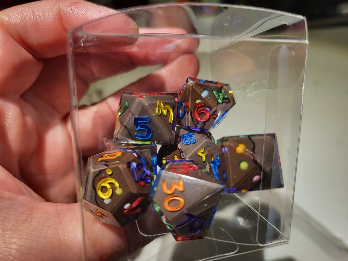 Cosmic brownie dice! I'll have these listed in my etsy once I get it set up. In the meantime, if anyone wants dice, let me know and we can get it worked out!