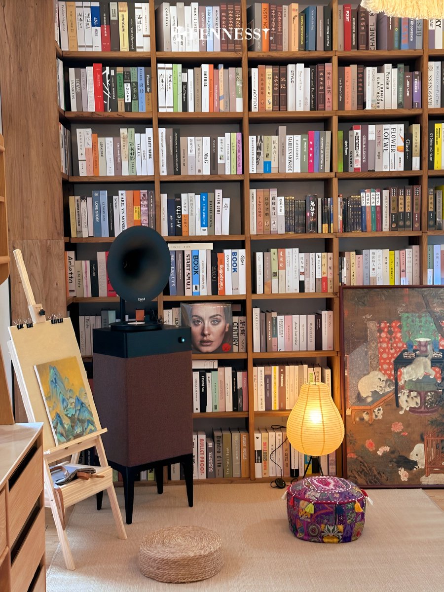 Create a haven for relaxation and discovery. 🎶📚 #Fennessy #Donuti5 #MusicAndBooks #PersonalRetreat #RelaxationZone #CozyHome #RelaxationSpace
