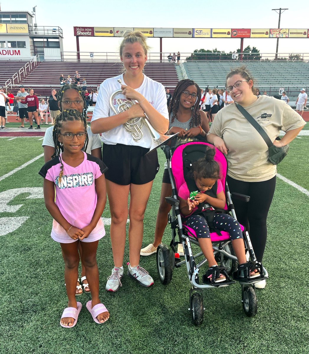 VarietyKids's tweet photo. After receiving her beautiful PINK adaptive stroller, Izzy's mom, BrieAnn shared a photo of her using last Fall to watch her older sister at IUP play in the marching band! We absolutely love seeing it!! #mystroller #adaptivestrollers https://t.co/qZvT4APxPg