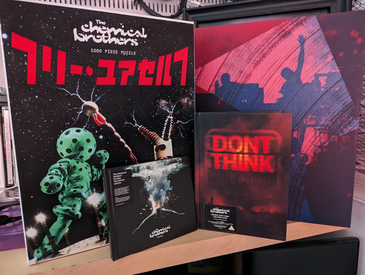TransRapid's tweet image. The extra bits that came in this edition of @ChemBros #PausedInCosmicReflection were definitely worth it. The box also really makes this section of my shelf.