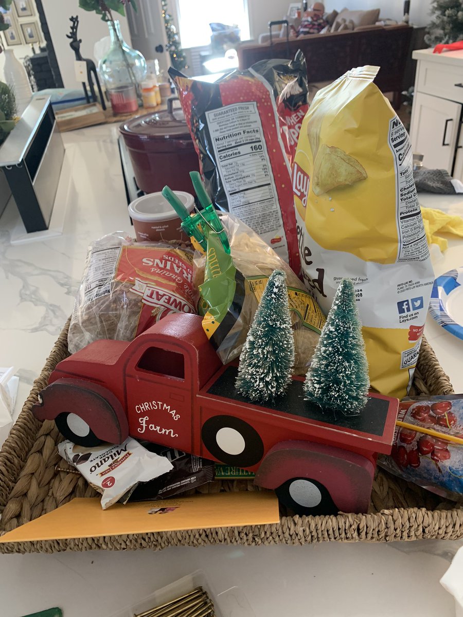 Well I be damned…. 
Is that a Little Red Truck hulling a Christmas Tree?