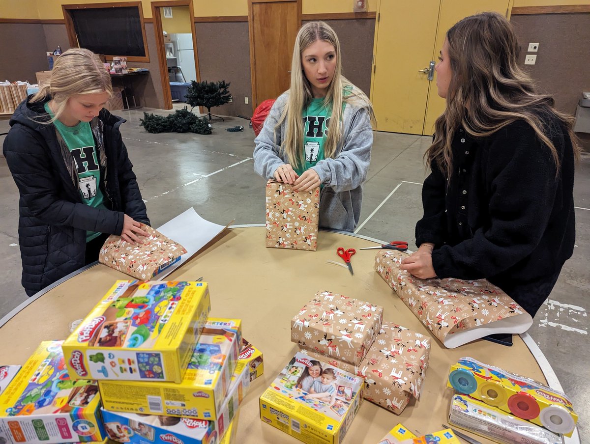 Some scenes from our gift wrapping today for Empower Youth!  We had a blast helping out such a wonderful organization and spreading Christmas cheer!