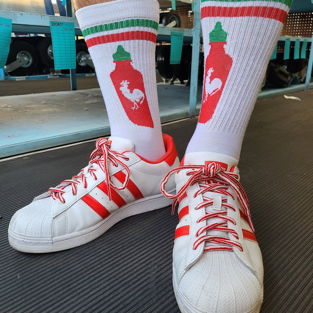 Sriracha Hot Sauce Christmas colors socks & Adidas Superstar #srirachasocks #sriracha #christmassocks @huyfongfoods #stockingstuffers #treelighting #popculture #ootd #sotd #adidas #classic #adidassuperstar #adidasclassic @adidas #yesadidas #threestripes #threestripelife