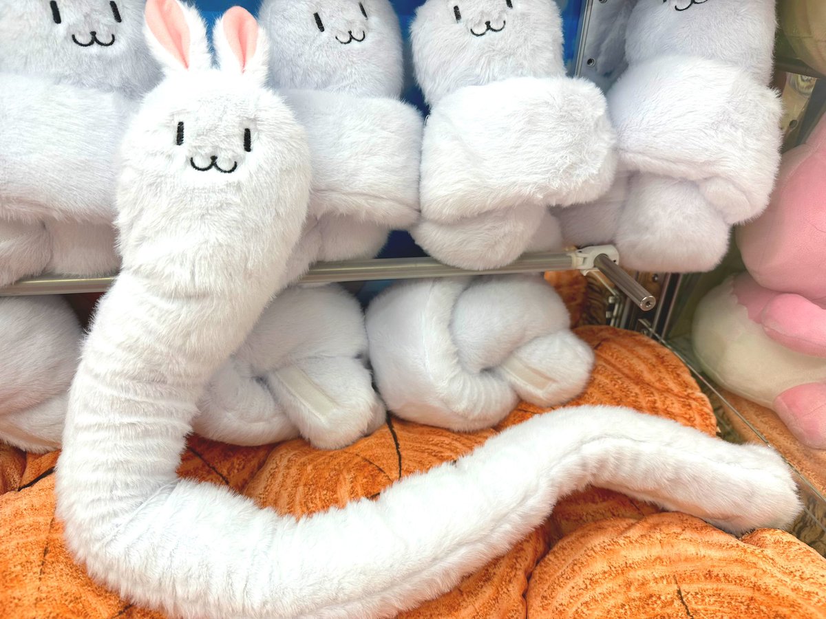 ぺこーらさんの首に巻きついてる 