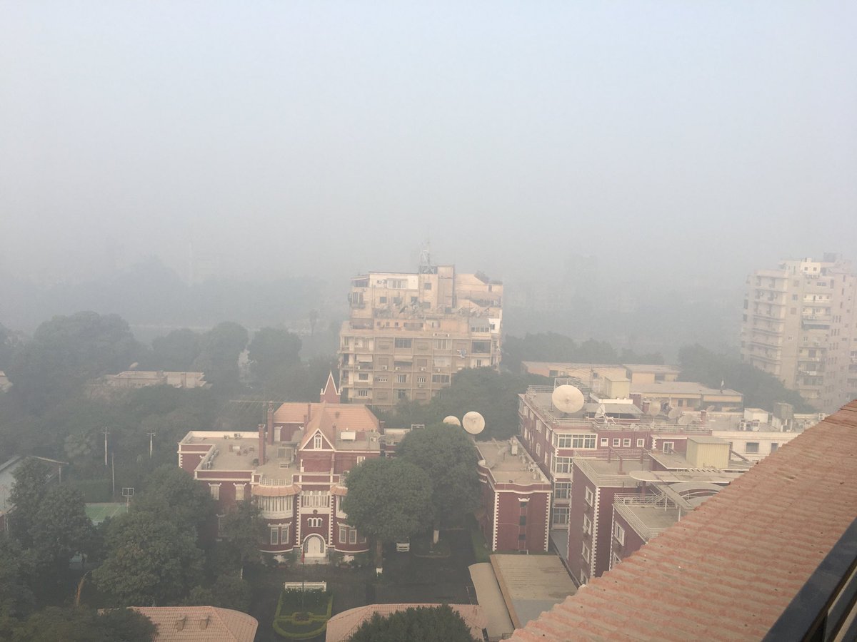 Sitting on the balcony of the President Hotel in Cairo. About to set off for another day of filming.