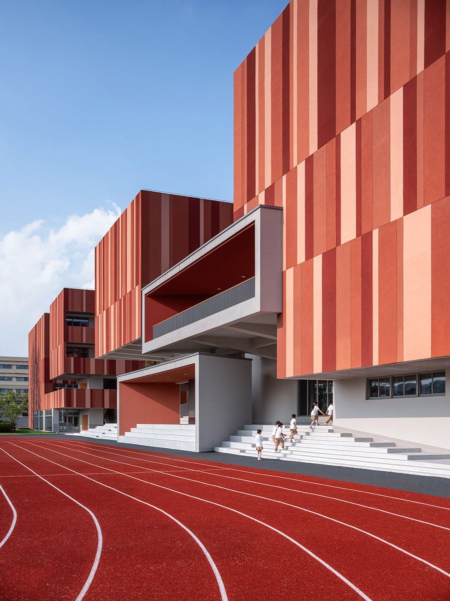 bright red #striped patterns overlay fengpu elementary #school's exterior in #shanghai