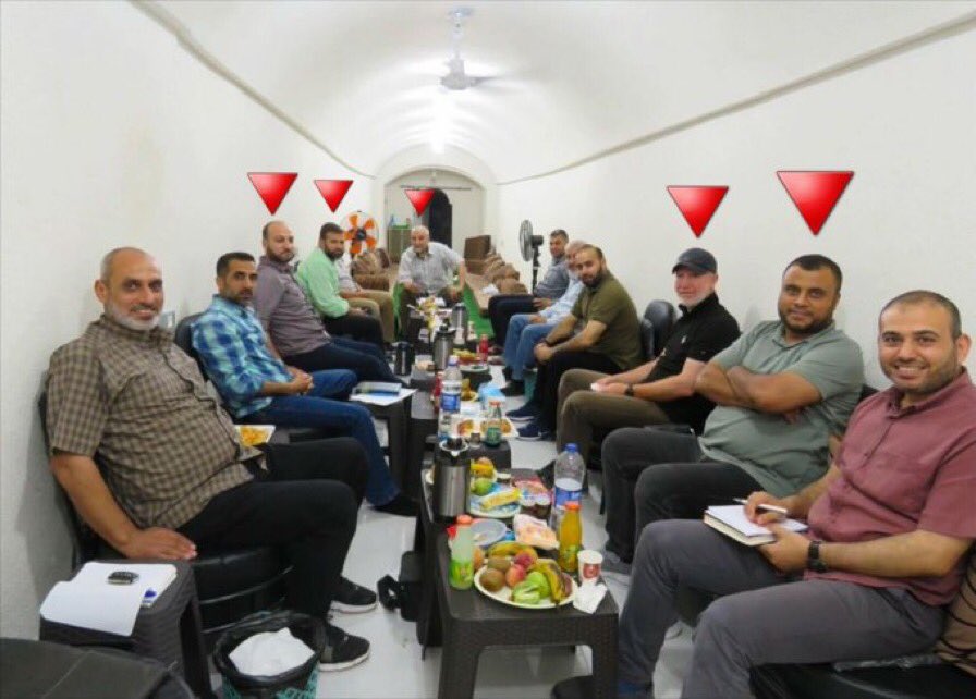 MalcolmNance's tweet photo. HAMAS HAS LUXURY TUNNELS: HAMAS officials in their underground command post. Everyone with the Red HAMAS triangle is dead.  The rest will soon follow.  
Then maybe we can #FreePalestine from the rest of the terrorists? https://t.co/FmpnHIb13B