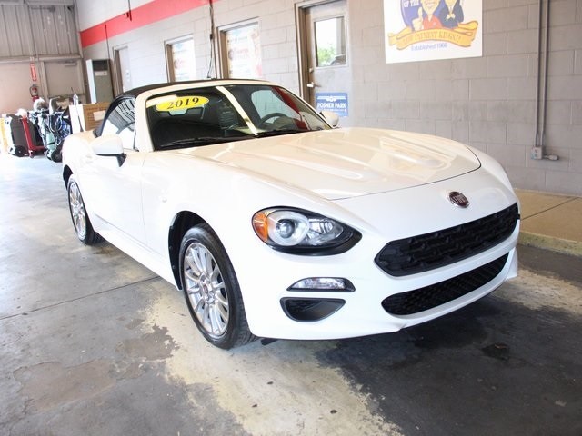 FIATofWH's tweet photo. We know you deserve a convertible this holiday season! 
Get yours today with a pre-owned Fiat 124 Spider roadster from The Low Payment Kings at Alfa Romeo FIAT of Winter Haven! 
Explore our inventory: https://t.co/8mvbRN6n46 
Se habla espanol #GetAmericaRollingAgain #LPK https://t.co/OHBstJTUkA
