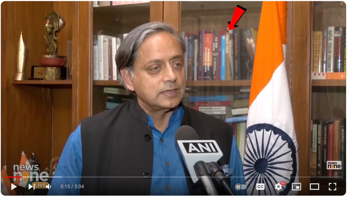 Subhashish30's tweet photo. A friend with a very sharp eye noticed my book, #CagedTiger, in @ShashiTharoor's bookshelf. An unexpected little moment of joy! https://t.co/t4dPFSbR1U