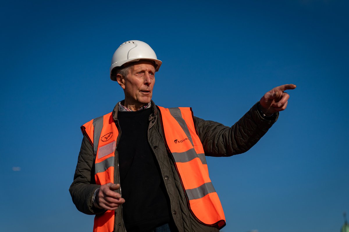Chris Johnson, 82, who worked on the roof at Smithfield Market in London, as an apprentice in the 60s, walks across the refurbished copper clad Poultry Market roof, where the new Museum of London will be rehomed on the former meat market site.