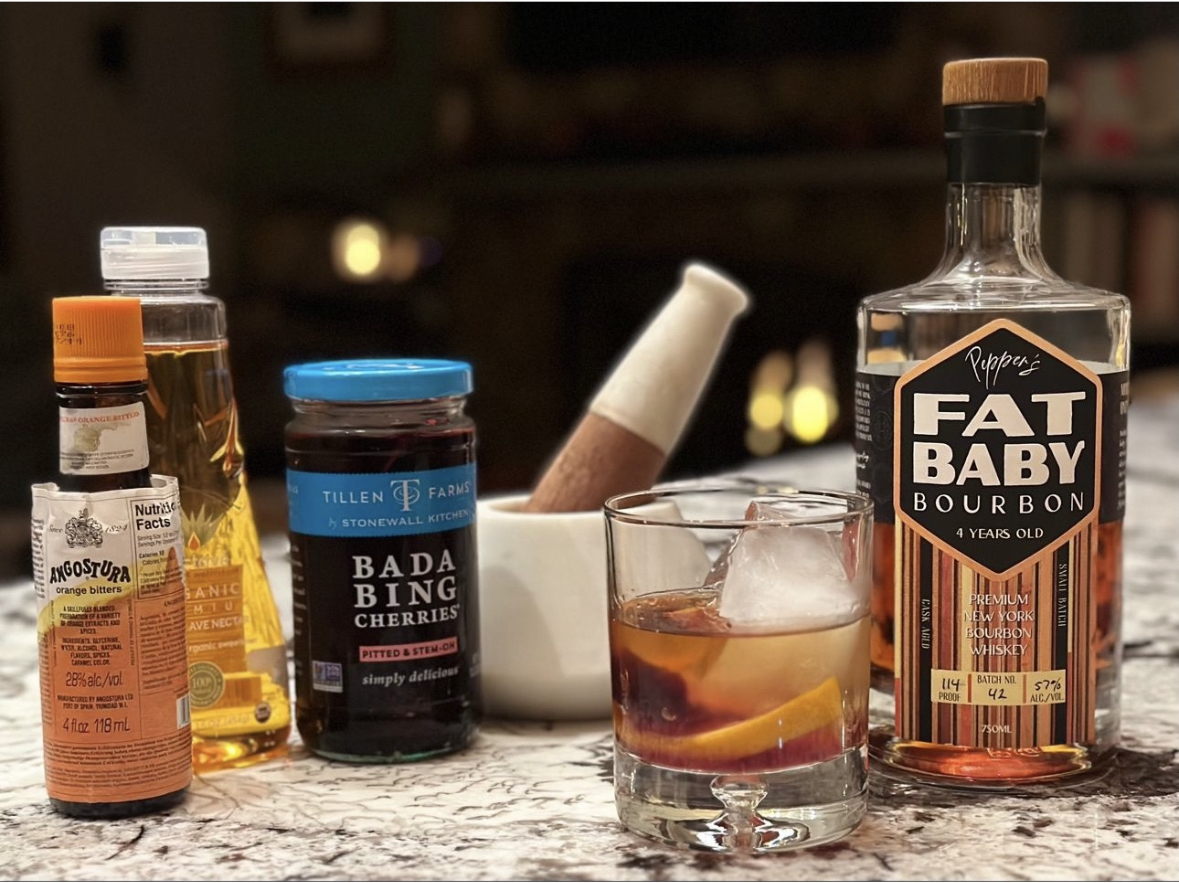 Loving this setup by Jules Nieves! 
.
repost: How I like my Fat Baby Bourbon! A bada bing cherrie, oj peel, little agave, bitters and a large cube! 
To learn more fatbabyco.com
#oldfashioned #bourbon #bourbongram 
#smallbatchbourbon #craftbourbon