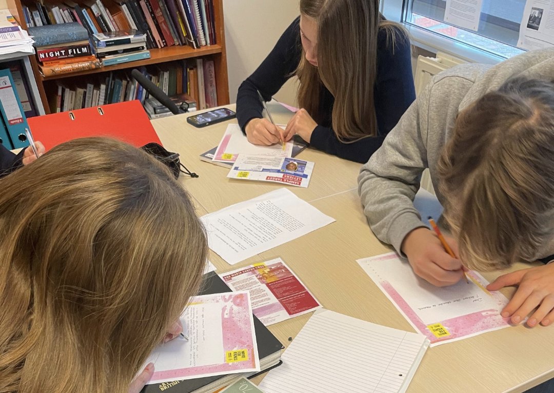 Year 12 taking part in <a href="/amnesty/">Amnesty International</a> Write for Rights campaign and writing to people in their home language.