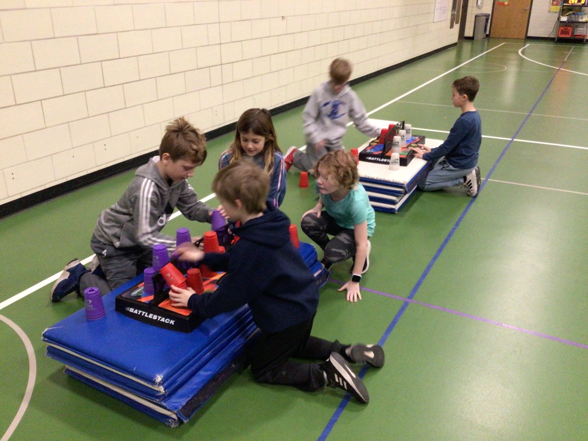 Cupstacking lesson #2.  1. Team Relay w/timer. 2. Self timer.  3. Doubles partners-one partner is the right hand other partner is the left hand.  4. BattleStacks-a friendly competition, first one down pushes the hand spots which tips over their opponent.