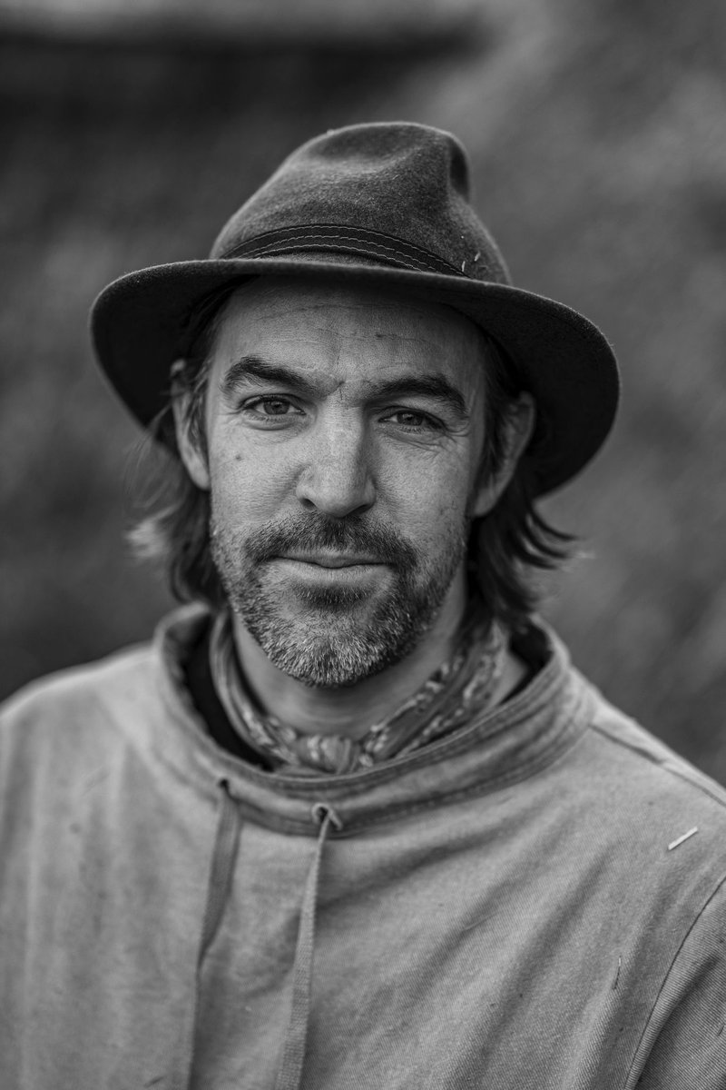 This is the face of a thatcher who is just finishing a the biggest roof he has thatched, during the wettest autumn he has worked through.

Relived, tired, dirty and proud.

Photo by <a href="/sibuckphoto/">SB</a>