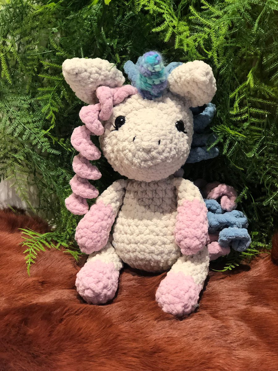 🌈✨ Just finished crafting my crochet masterpiece – behold, the majestic unicorn! 🦄🧶 Unleashing my inner wizardry with yarn and a dash of sparkle. Who needs reality when you can have a mythical friend on your couch? 🪄💖 #CrochetMagic #UnicornDreams #CraftyCreation