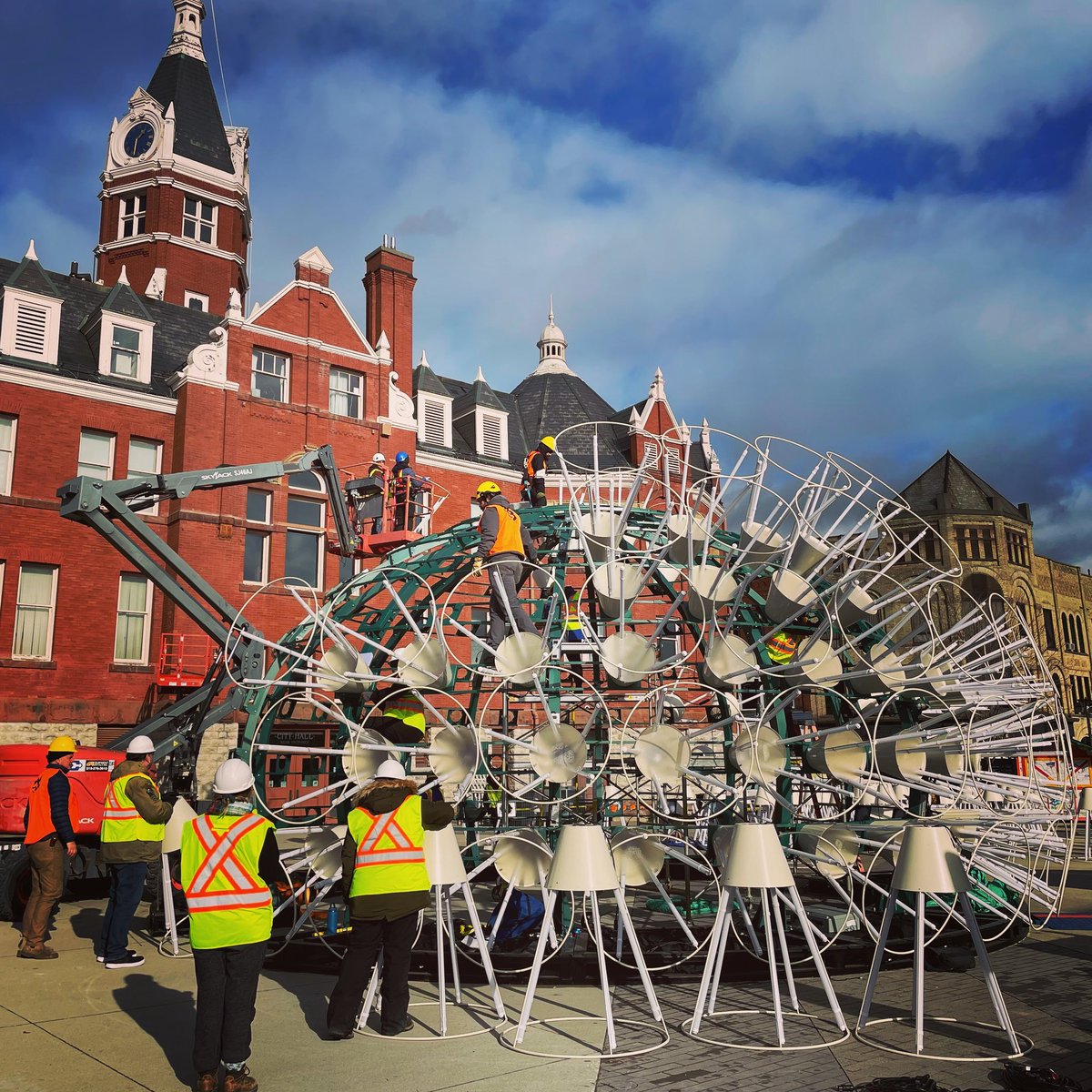 Busy bees working hard at cross-pollinating DANDELION light art from Australia to Canada. Lightsonstratford.ca #lovestratford #lightsonstratford <a href="/StratfordON/">Destination Stratford</a>