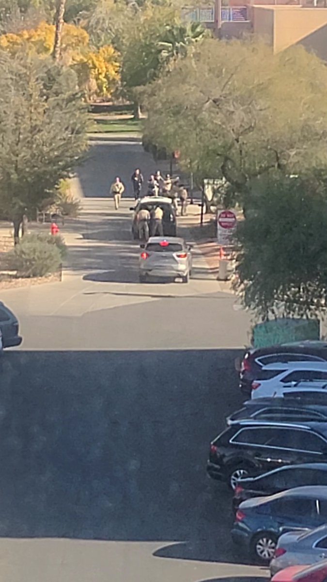 worsttourguide's tweet photo. @FOX5Vegas From the library, I see a lot of police https://t.co/6WRXvrnoz0