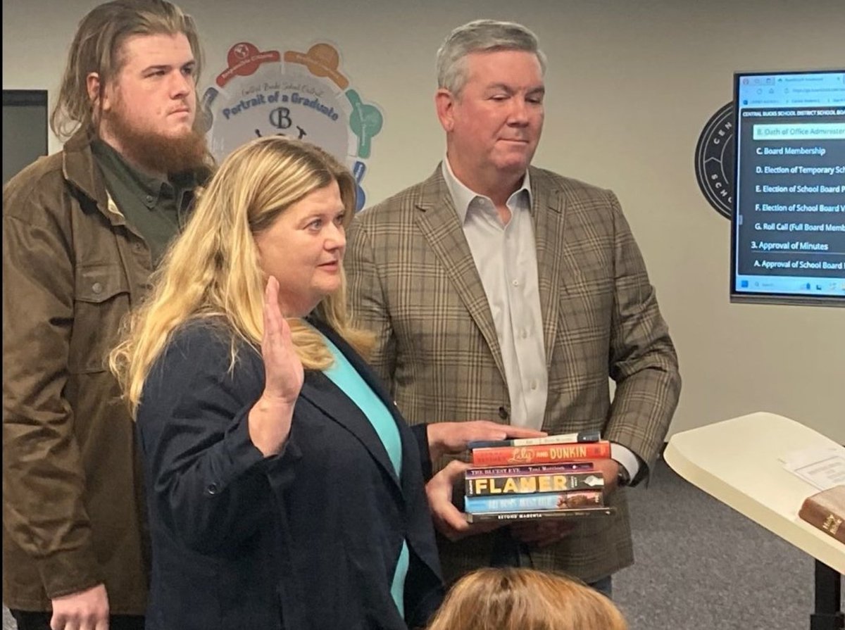 Holy sh*t, this is AWESOME: Karen Smith, the new school board president for Central Bucks, PA, did her swearing in on a stack of banned books instead of a Bible. BRILLIANT! 👏👏👏