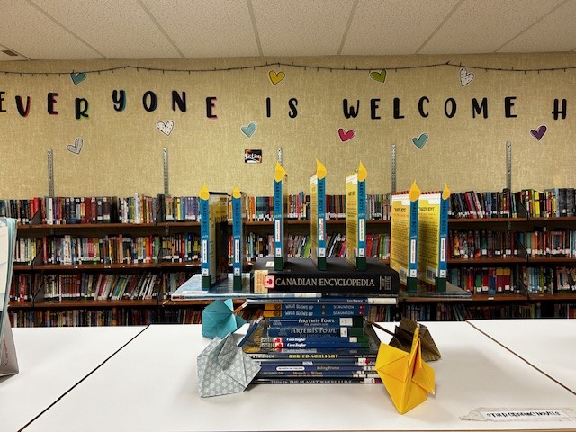 Check out the menorah and dreidels in the Library Learning Commons at Sangster in preparation for Hannukah! #sd62